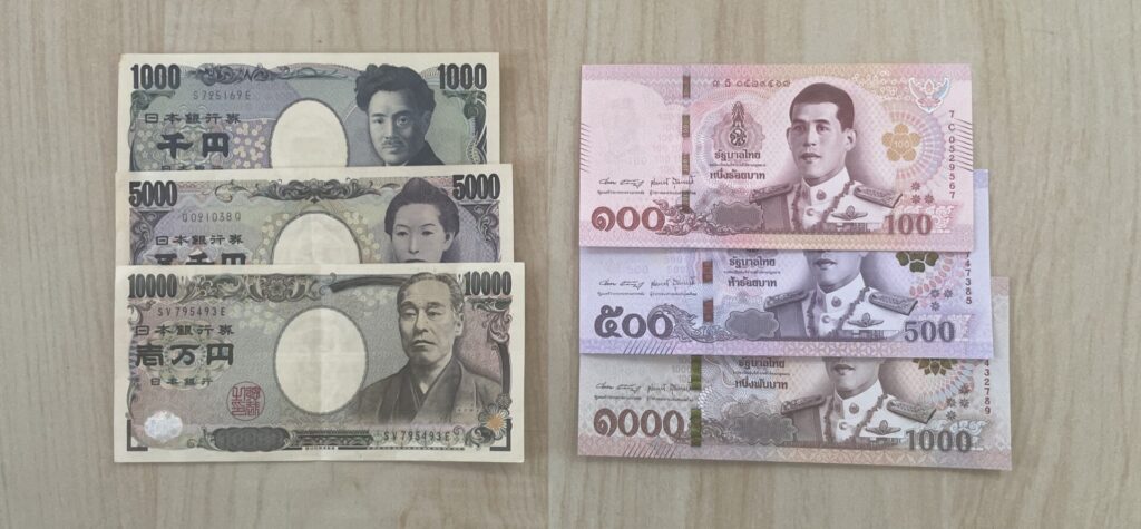 日本円とタイバーツ紙幣の画像